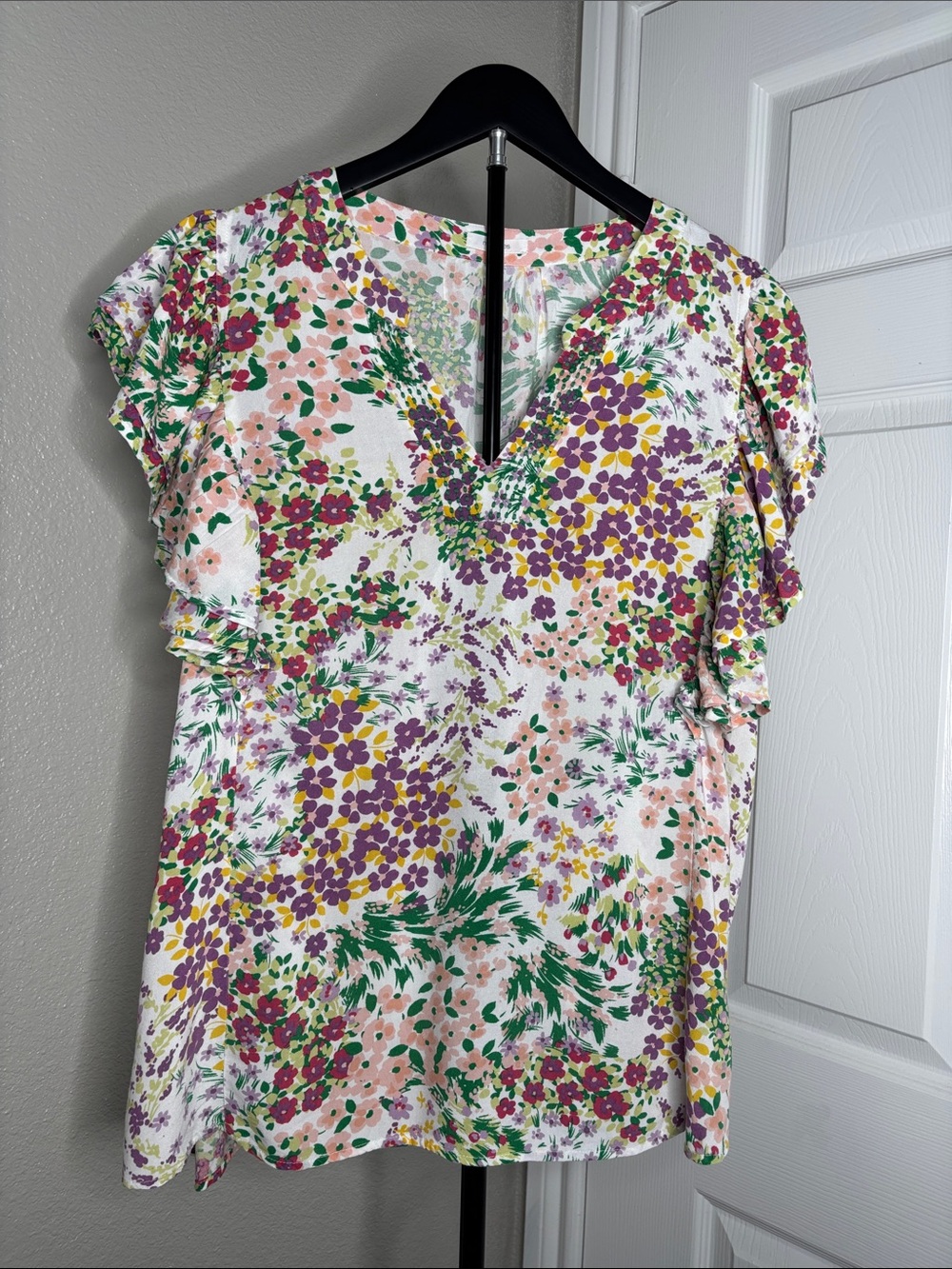 Maurices White Floral V-Neck Top with Pastel Pink, Purple & Green Print
